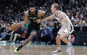 Jayson Tatum anota 34 y los Celtics vencen a los Bucks en el debut de temporada de Middleton