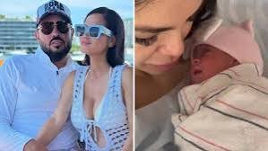Natti Natasha y Raphy Pina dan la bienvenida a Dominique Isabelle, su segunda hija