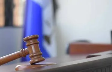 Tribunal condena mujer a la que se le imputó vender municiones de la policía dominicana a haitianos